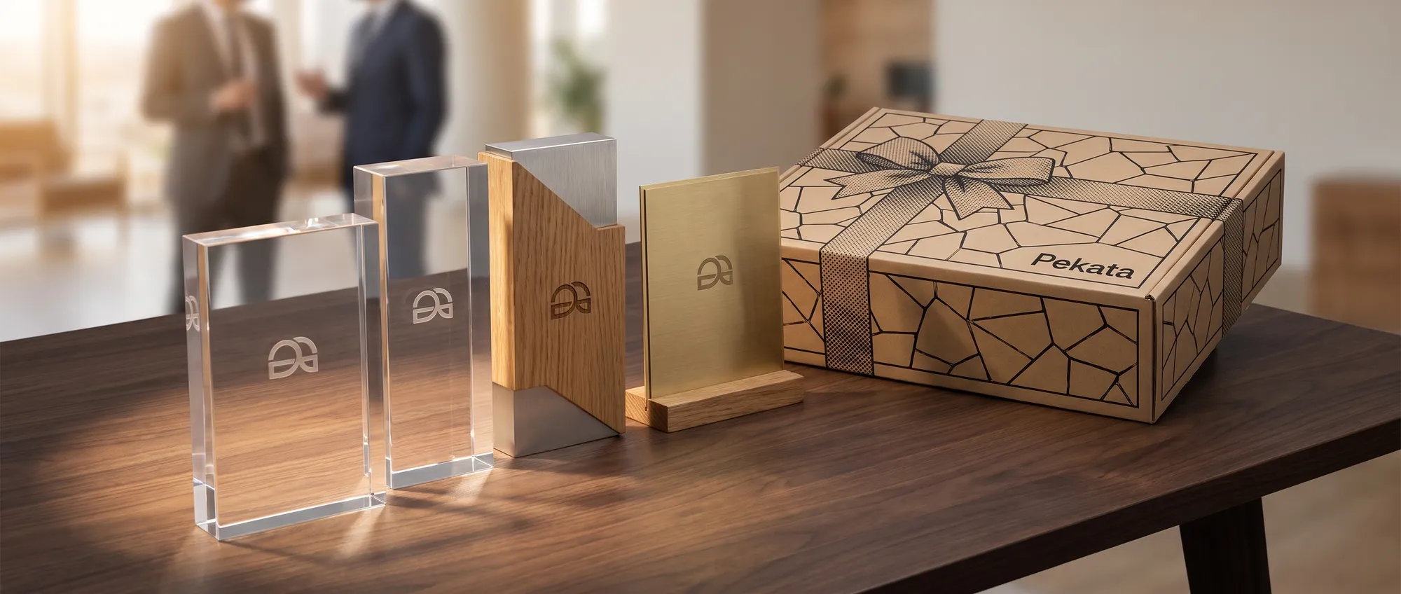 Custom trophies for businesses in acrylic and engraved glass with a company logo