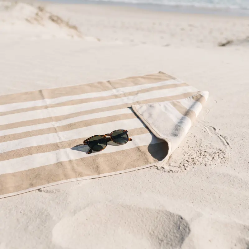 Strandtücher und Pareos